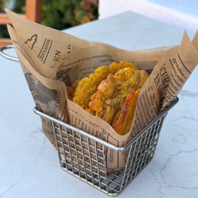 Side Tostones.
